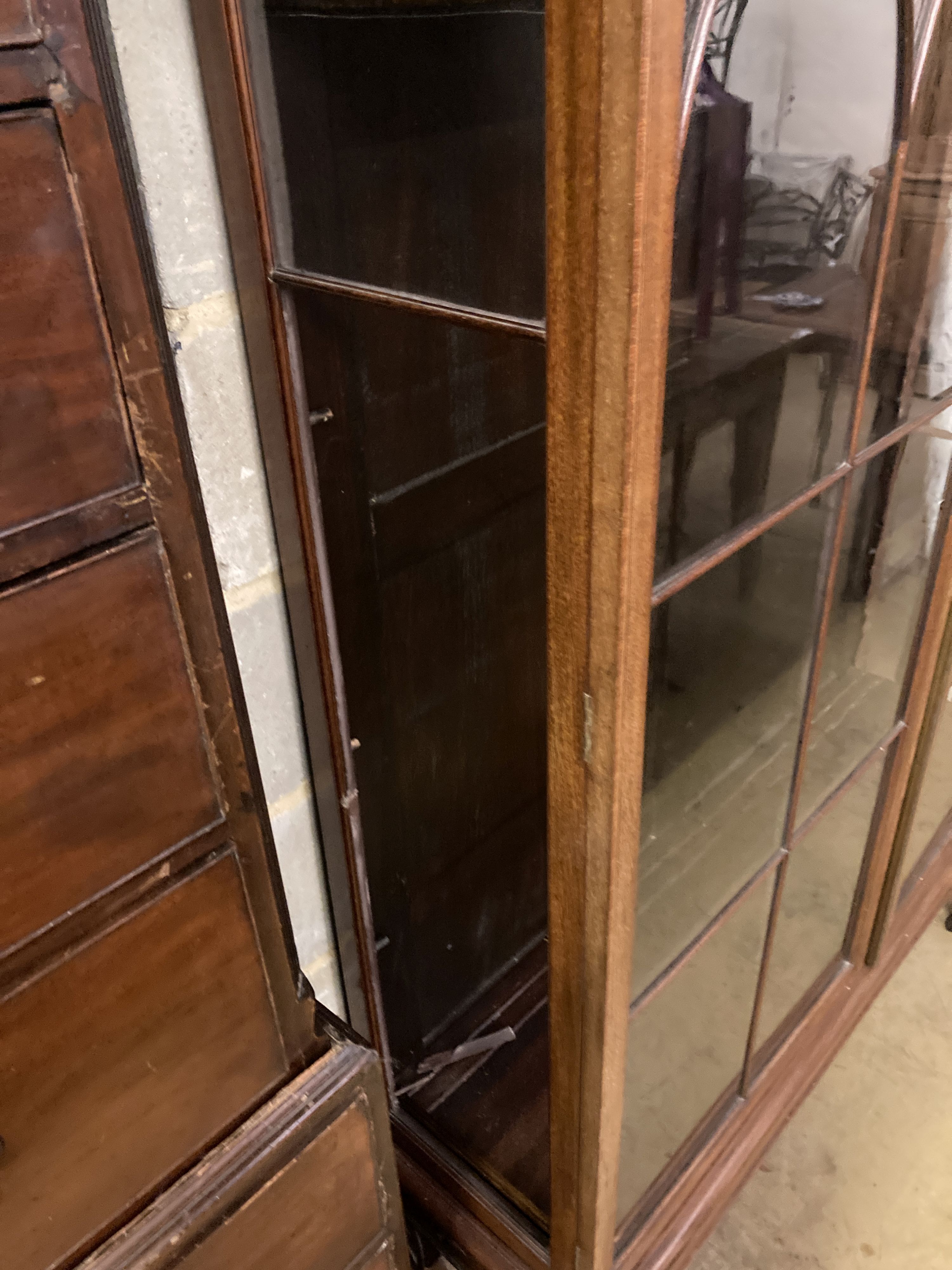 An Edwardian satinwood banded mahogany two door display cabinet, width 126cm, depth 39cm, height 204cm